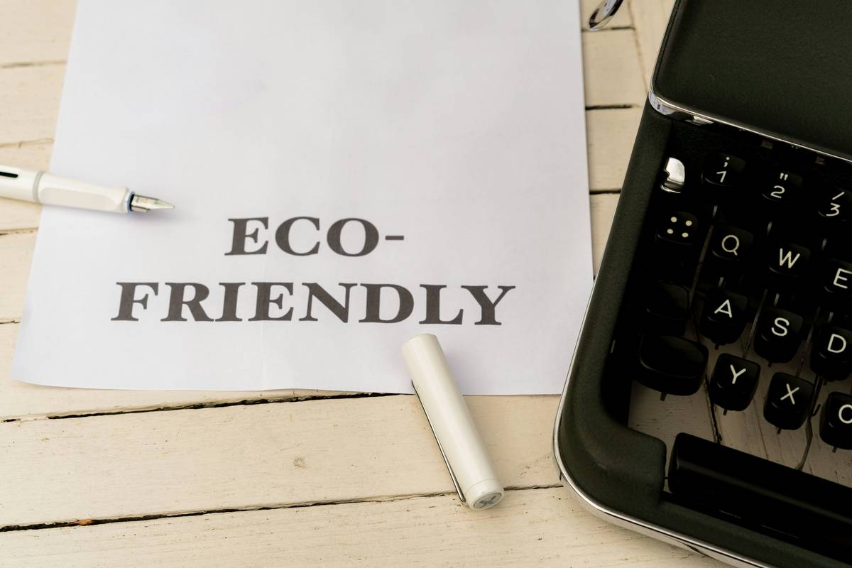 Business owner reviewing Environmental Fines Reimbursement coverage options with broker