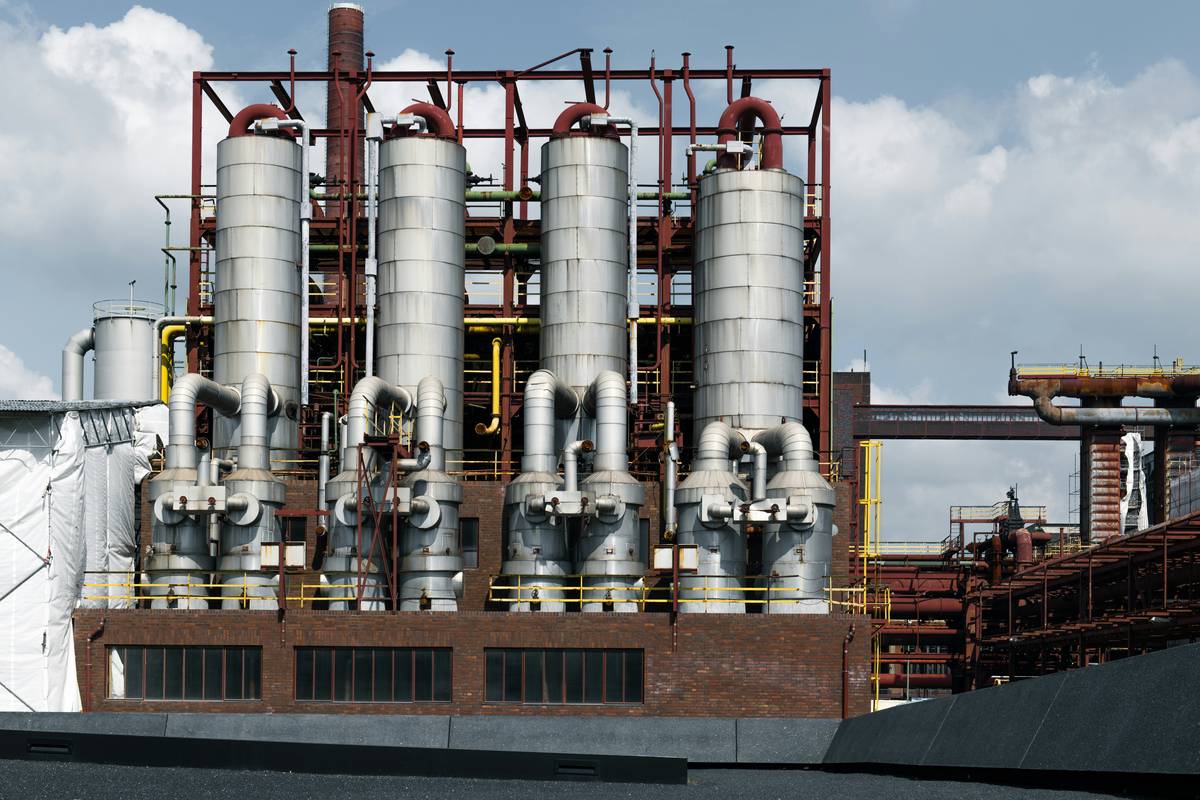 Industrial facility using advanced Pollution Control Technologies to reduce emissions and qualify for environmental insurance discounts