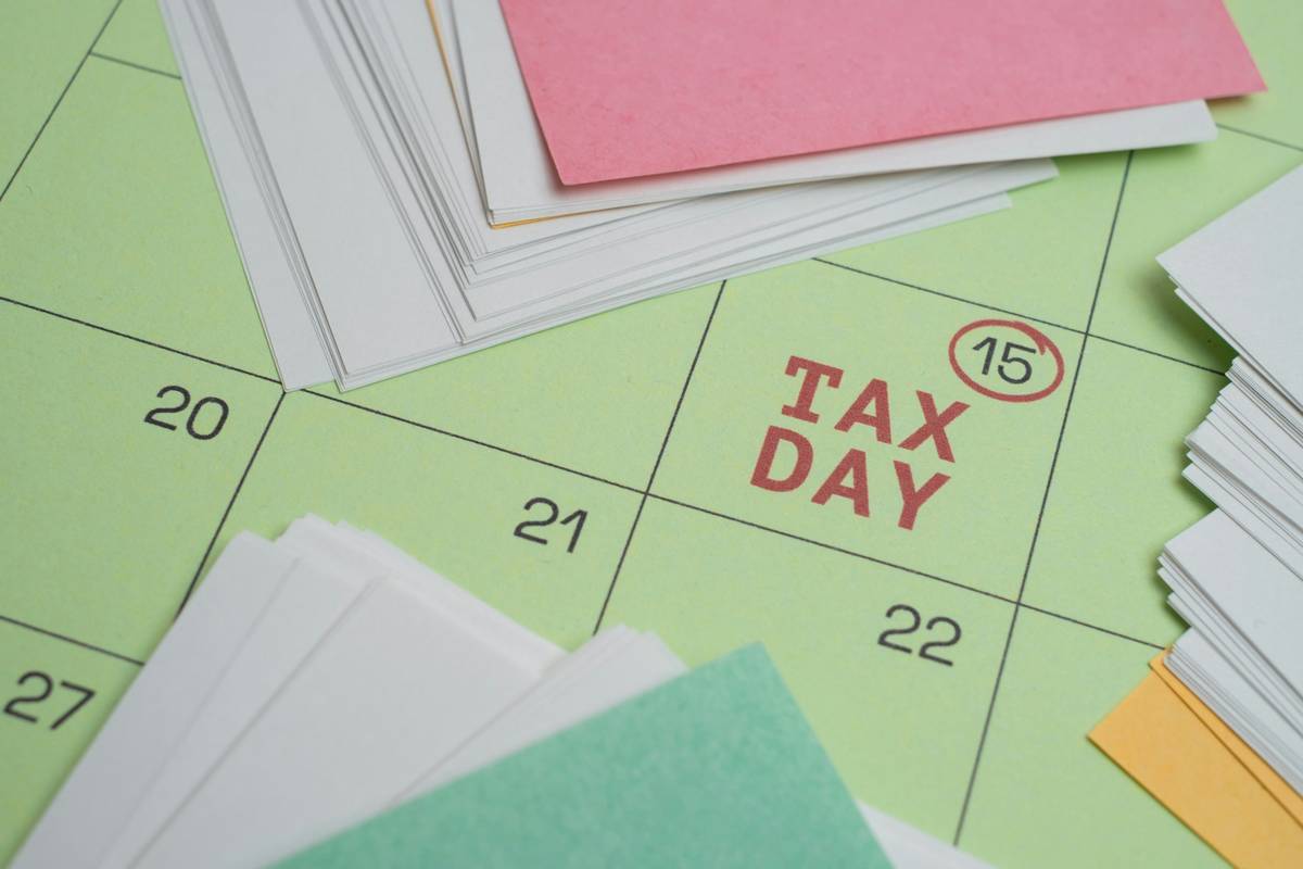 Calendar with red 'Claim Submission Deadlines' stamp next to environmental testing equipment